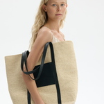 Torba z naturalnej rafii w kolorze naturalnym wykończona czarną skórą caviar